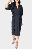 Front of Woman wearing Black Jennifer Drape Front Luxe Knit Surplice Dress