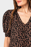Close-up of Woman wearing Puff Sleeve V-Neck Blouse in Black Vine
