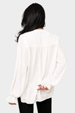 Back of Woman wearing Long Sleeve Blouse with Ruffled Cuff in Off White