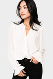 Front of Woman wearing Long Sleeve Blouse with Ruffled Cuff in Off White