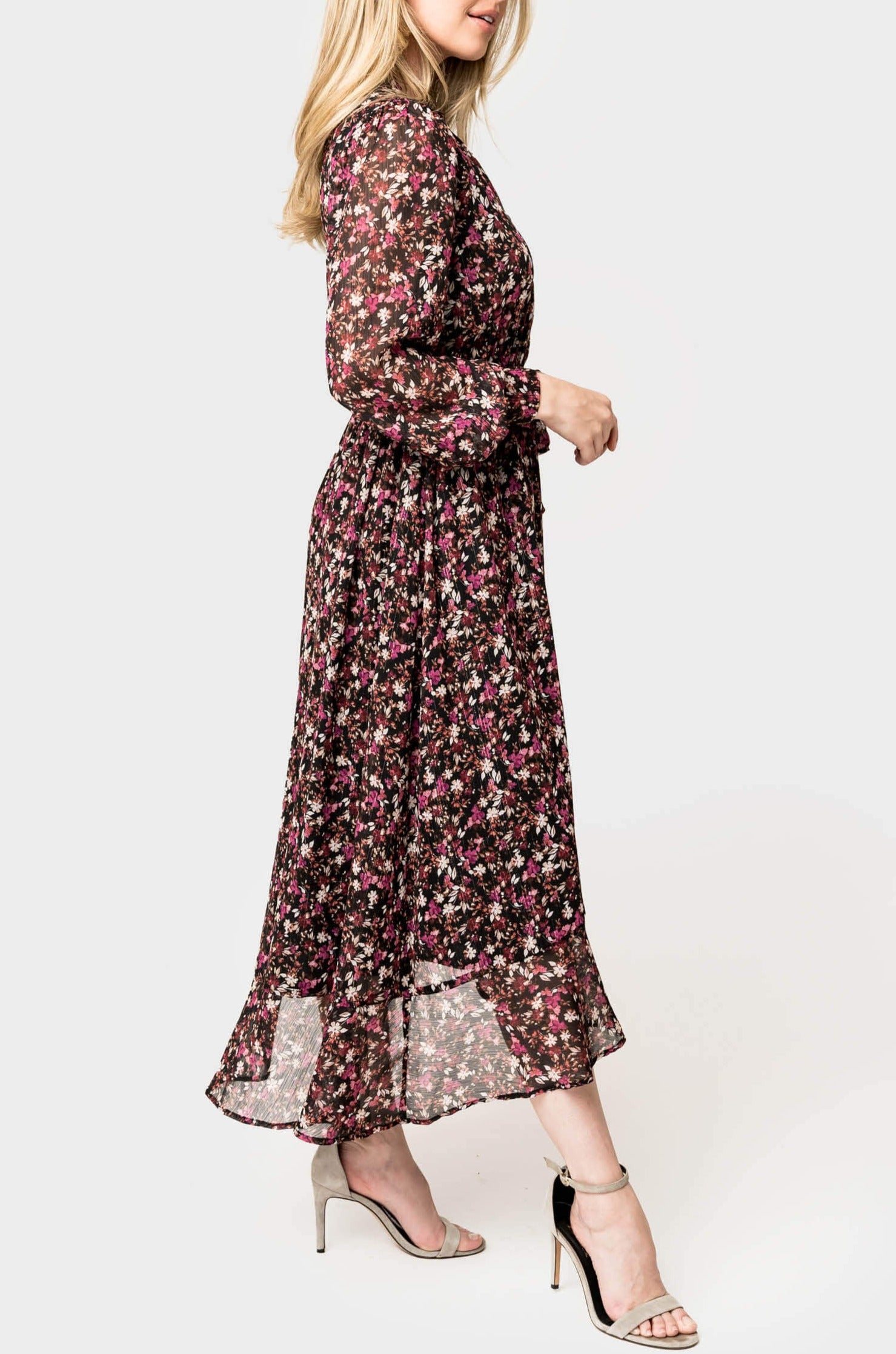 Side of Woman wearing Chiffon Ruffle Hi-Low Maxi Dress in Festive Berry Floral