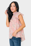 Side of Woman wearing Flutter Sleeve Smocked Neck Blouse in Rose Bouquet Print