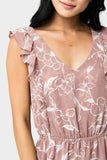Close-up of Woman wearing Sleeveless V-Neck Ruffle Trim Maxi Dress in Woodrose Ivory Floral