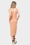 Back of Woman wearing Almond Bisque Double V Ribbed Knit Midi Dress with Side Slit